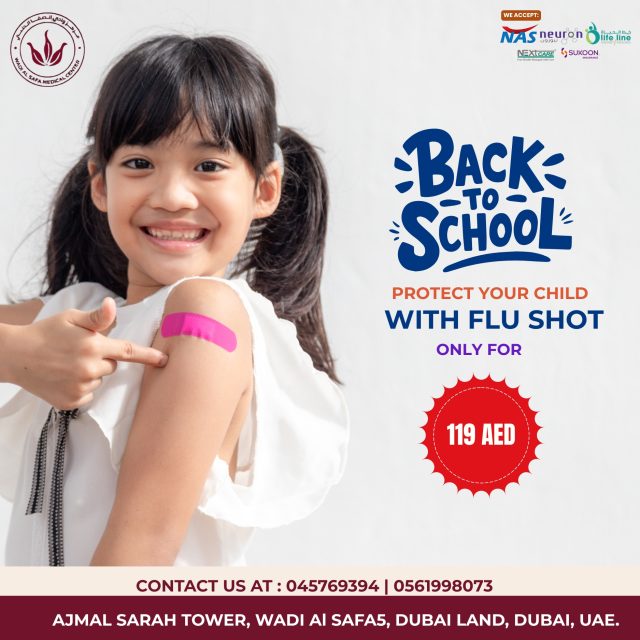 Smiling child pointing at flu shot bandage on arm – Back to School Flu Vaccination at Wadi Al Safa Medical Center, Ajmal Sarah Tower, Wadi Al Safa 5, Dubai Land, Dubai, UAE. Protect your child with flu vaccine for only 119 AED. Call 045769394 or 0561998073. We accept NAS, Neuron, Nextcare, Lifeline, and Sukoon insurance